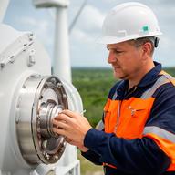 Obida Mezano, lead wind engineer, examining turbine components at a Florida energy site